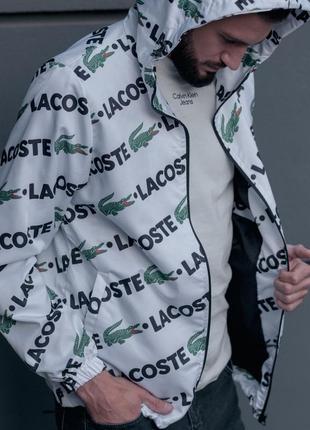 Мужская осенняя ветровка куртка lacoste с капюшоном белая мужская ветровка lacoste2 фото