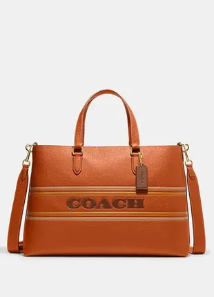 Оригинальная кожаная сумка coach logan carryall with coach stripe2 фото