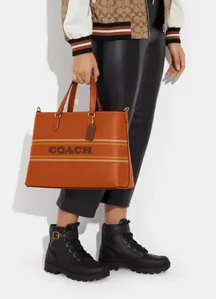 Оригинальная кожаная сумка coach logan carryall with coach stripe1 фото