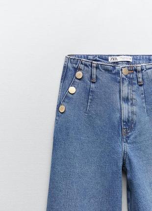 Широкі укорочені джинси10 фото