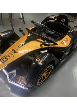 Детский гоночный электромобиль mclaren formula 1 (черный/золотистый цвет) 12v