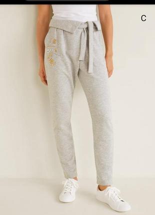 Штани фірми mango