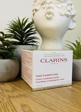 Оригинальный дневной омолаживающий крем clarins nutri-lumière day cream оригинал дневный крем