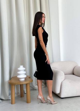 Черное платье миди приталенного силуэта7 фото