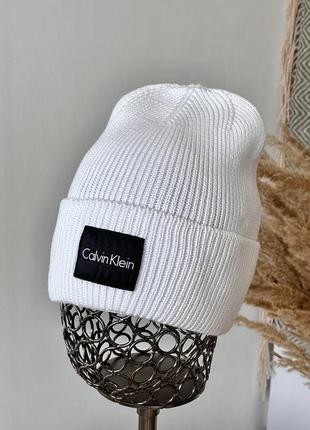 Шапка вязаная в рубчик с отворотом