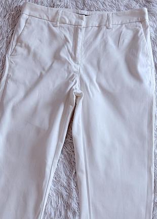 Белые брюки next
