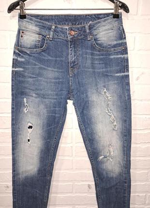 Женские рваные джинсы2 фото