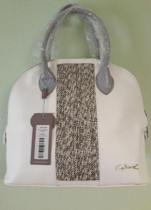 Стильная сумка бренда axel греция.7 фото