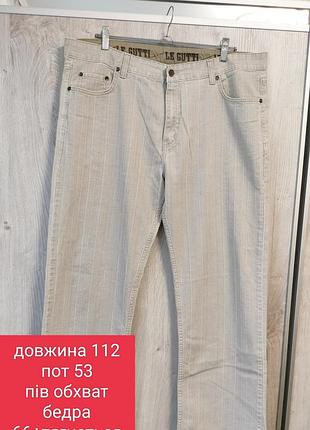 Джинсы мужские большего размера.