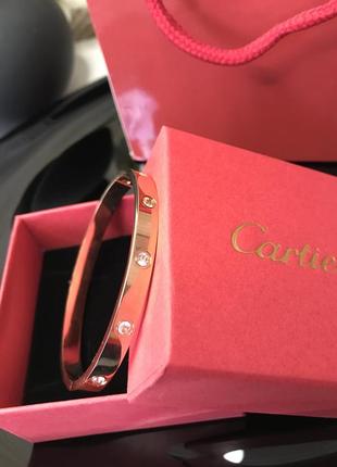 Браслет стиль cartier у рожевому золоті  з камінцями