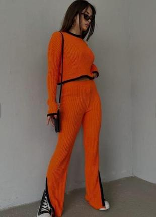 Женский трикотажный костюм: укороченный свитер и широкие брюки кюлоты с разрезами s, m3 фото