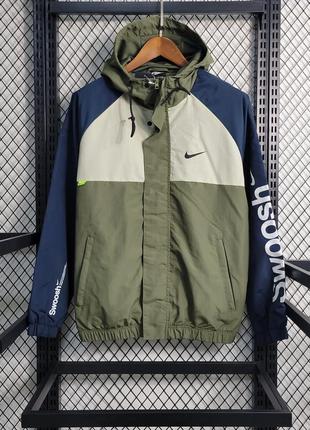 Nike windbreaker swoosh hotsell