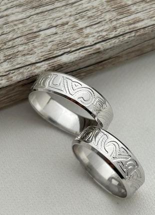 Кольца обручальные серебряные с растительным орнаментом7 фото