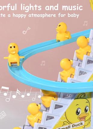 Інтерактивна дитяча іграшка трек з качечками на магнітах із музикою і світловими ефектами small duck6 фото