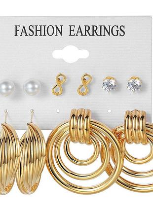 Набір сережок  в золотистому кольорі  6 шт