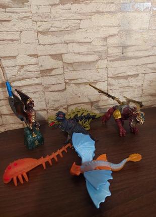 Игрушечные драконы и динозавры