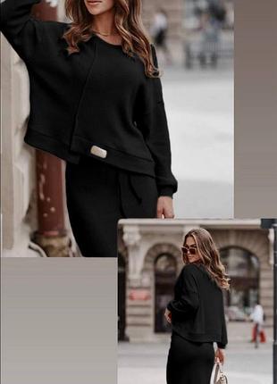 Костюм кофта свободная вырез круглый рукав  манжет спереди ассиметрия низ на манжете  юбка миди прямая на резинке с разрезом ткань рубчик на флисе