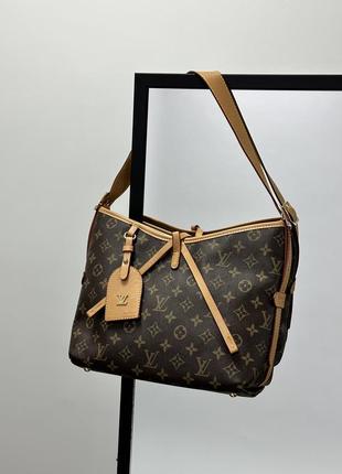 Жіноча сумка преміум якості у брендовому гравіюванні