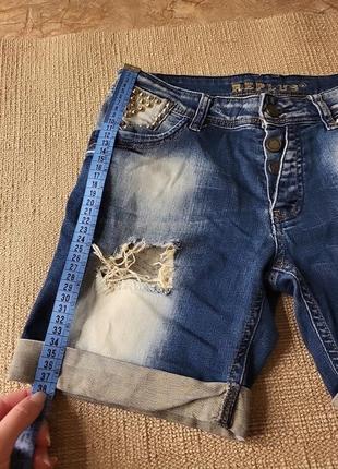 Бриджі шорти шипи потерті заклепки джинсові 26 розмір еєнські жівочка жінка підлітковий2 фото