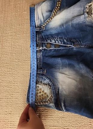 Бриджі шорти шипи потерті заклепки джинсові 26 розмір еєнські жівочка жінка підлітковий4 фото
