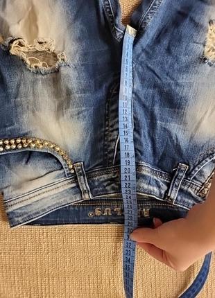 Бриджі шорти шипи потерті заклепки джинсові 26 розмір еєнські жівочка жінка підлітковий5 фото