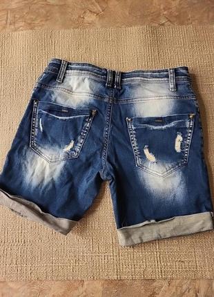 Бриджі шорти шипи потерті заклепки джинсові 26 розмір еєнські жівочка жінка підлітковий6 фото