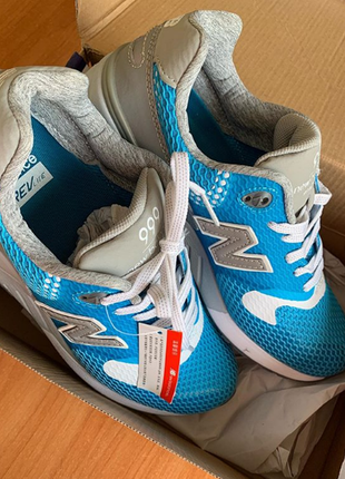 Кроссовки new balance голубого цвета с серым декором в наличии2 фото