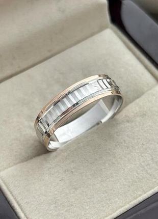 Обручальное кольцо серебряное с золотыми напайками и орнаментом