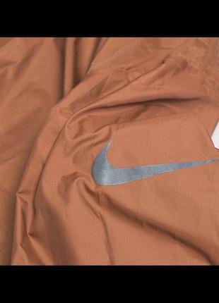 Бігова куртка nike run division lightweight packable jacket - m6 фото