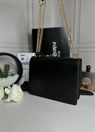 Женская трендовая сумочка yves saint laurent | сумка черная с золотистым лого ив сен лоран2 фото