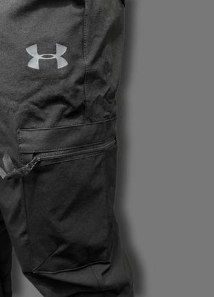 Чоловічі спортивні штани карго under armour1 фото