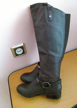 Новые кожаные сапоги