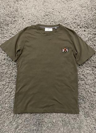 Футболка жіноча кольору хакі з лого від christian lacroix