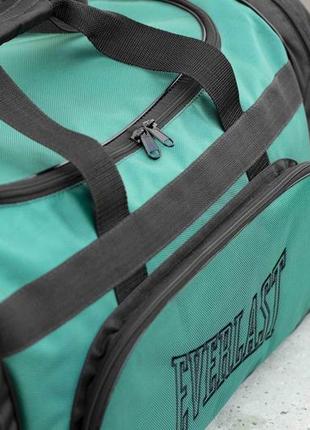 Мужская дорожная спортивная сумка everlast biz зеленая для тренировок в дорогу на 60 литров8 фото