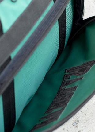 Мужская дорожная спортивная сумка everlast biz зеленая для тренировок в дорогу на 60 литров9 фото