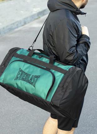 Мужская дорожная спортивная сумка everlast biz зеленая для тренировок в дорогу на 60 литров6 фото
