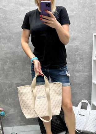 Велика біла жіноча сумка guess, на два відділення7 фото