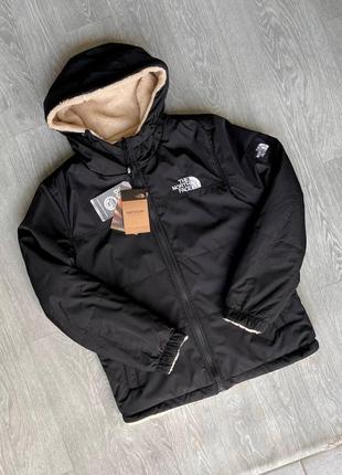 Двохсторонні куртки the north face7 фото