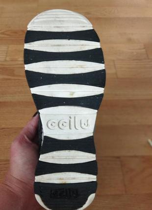 Кроссовки ccilucell резиновые.