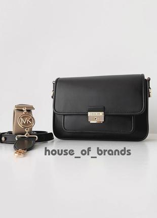 Женская брендовая кожаная сумочка michael kors bradshaw medium messenger bag сумка оригинал кожа мишель корс майкл корс на подарок жене девушке1 фото