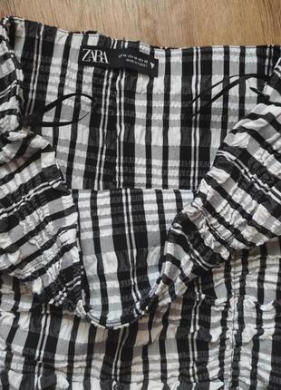 Клетчатая мини юбка со сборками драпировкой и высокой талией6 фото