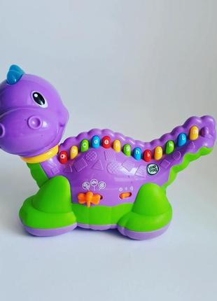 Інтерактивна розвиваюча іграшка динозаврик leapfrog
