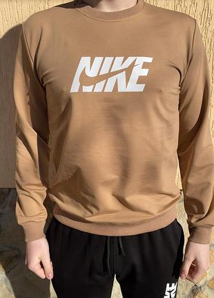 Бежевий світшот з надписом «nike »