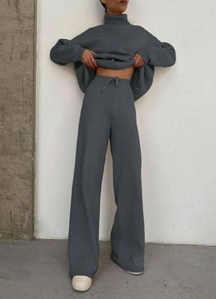 Женский теплый прогулочный костюм с брюками клеш6 фото