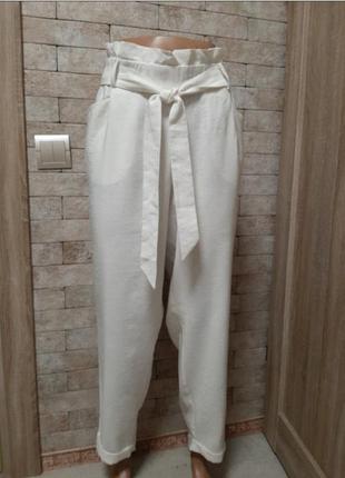 Брюки с защипами
