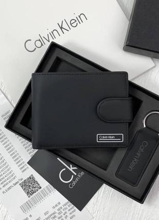 Гаманець чоловічий шкіряний на кнопці чорний calvin klein подарунковий набір із натуральної шкіри гаманець і брелок