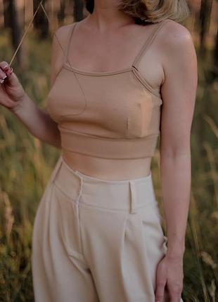 Бежевий топ в рубчик