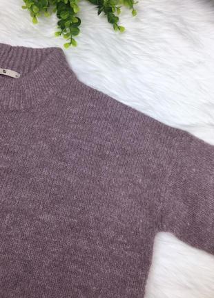 Теплый свитер с бахромой2 фото