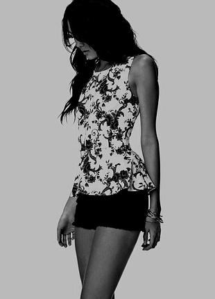 Блузка трикотажная  с баской.смотрится не реально круто на теле