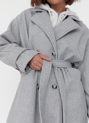 Женское двубортное пальто макси под пояс.3 фото
